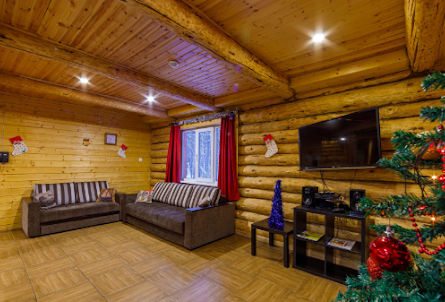 Зал в коттедже «Избушка Егеря» в Зал в коттедже «Избушка Егеря»