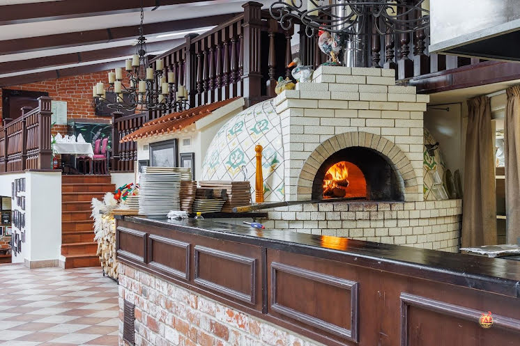 Зал с дровяной печью в «Татарская усадьба» фотография №13