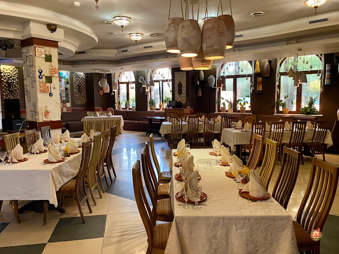 Основной зал ресторана в «Очаг Grill» фотография №3