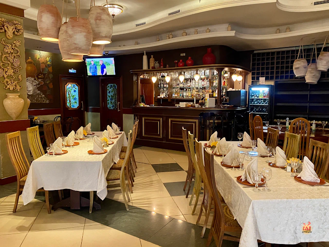 Основной зал ресторана в «Очаг Grill» фотография №2